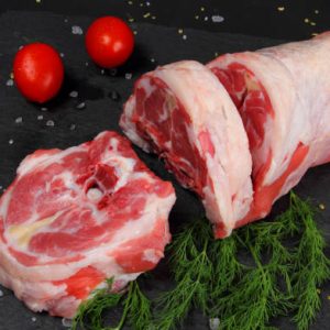 Raw Neck Meat on the Black Table